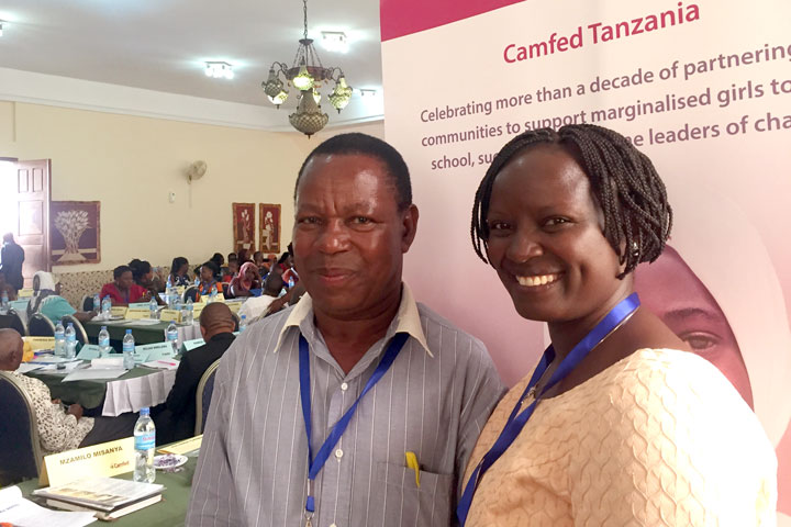 Lydia Wilbard of Camfed Tanzania with Mzamilo Misanya, Head of a partner school