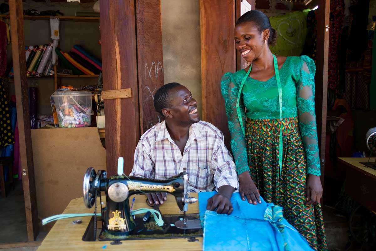 Paulina and Lucian at her tailoring business