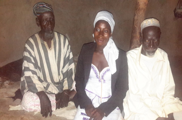 District Councillor and CAMA member Safura Yussif visiting with the local Chief and his spokesperson