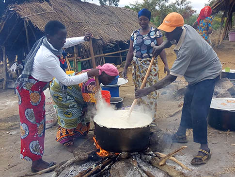 Aida Kalolo cooking with a Parent Support Group Aida Kalolo cooking with a Parent Support Group