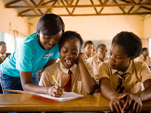 CAMFED alumna Alice and secondary student Faith CAMFED alumna Alice and secondary student Faith