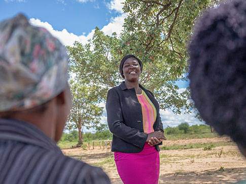 Clarah and community members in rural Zimbabwe