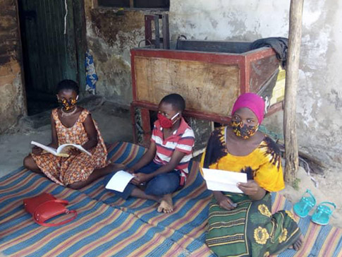 Learner Guide Jamila (right) visits students at home Learner Guide Jamila (right) visits students at home