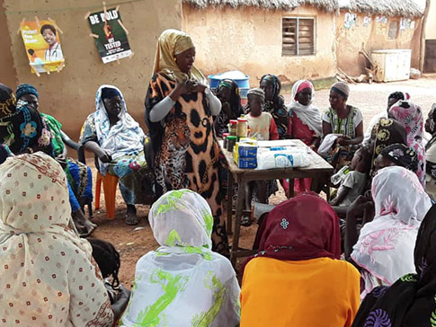 Fatima conducts a community outreach session