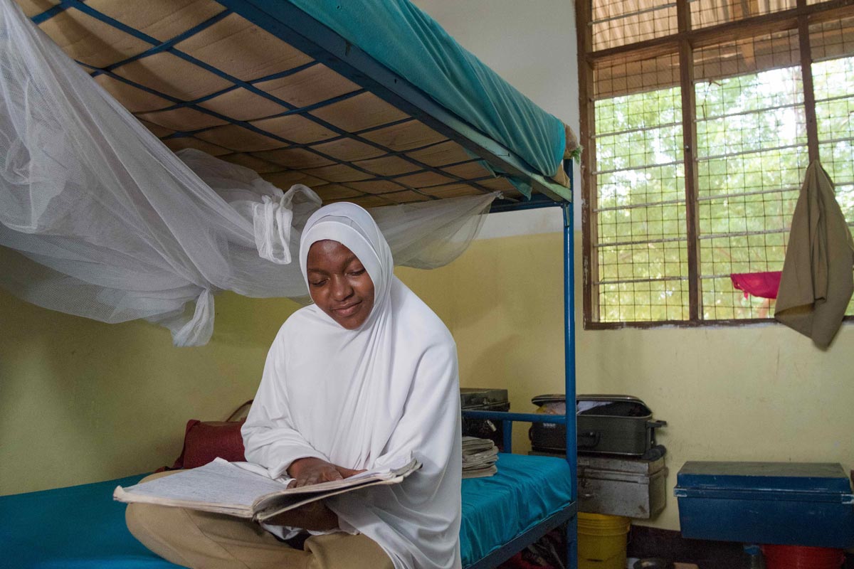 Sharifa studying in her school dorm in Tanzania