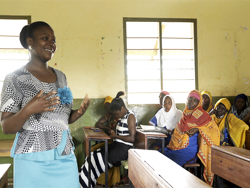 Stumai sharing information with her community