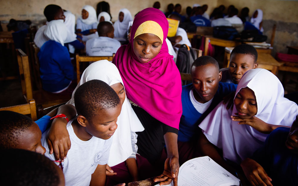 Zuhura supporting her students with the My Better World life skills curriculum