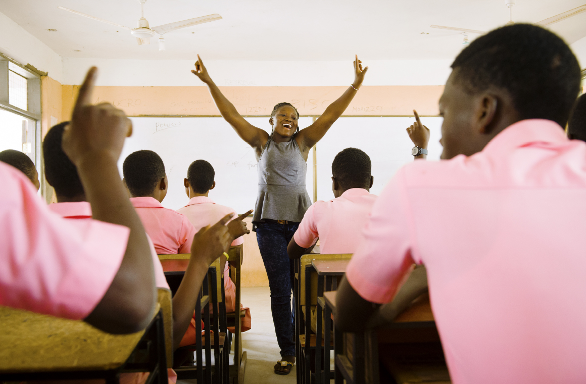 Mercy, a CAMFED Association member in Ghana, leading a life skills and wellbeing session for secondary students