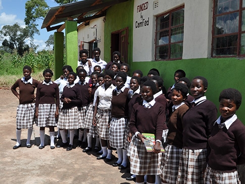 Rockcilia and her classmates outside the school hostel